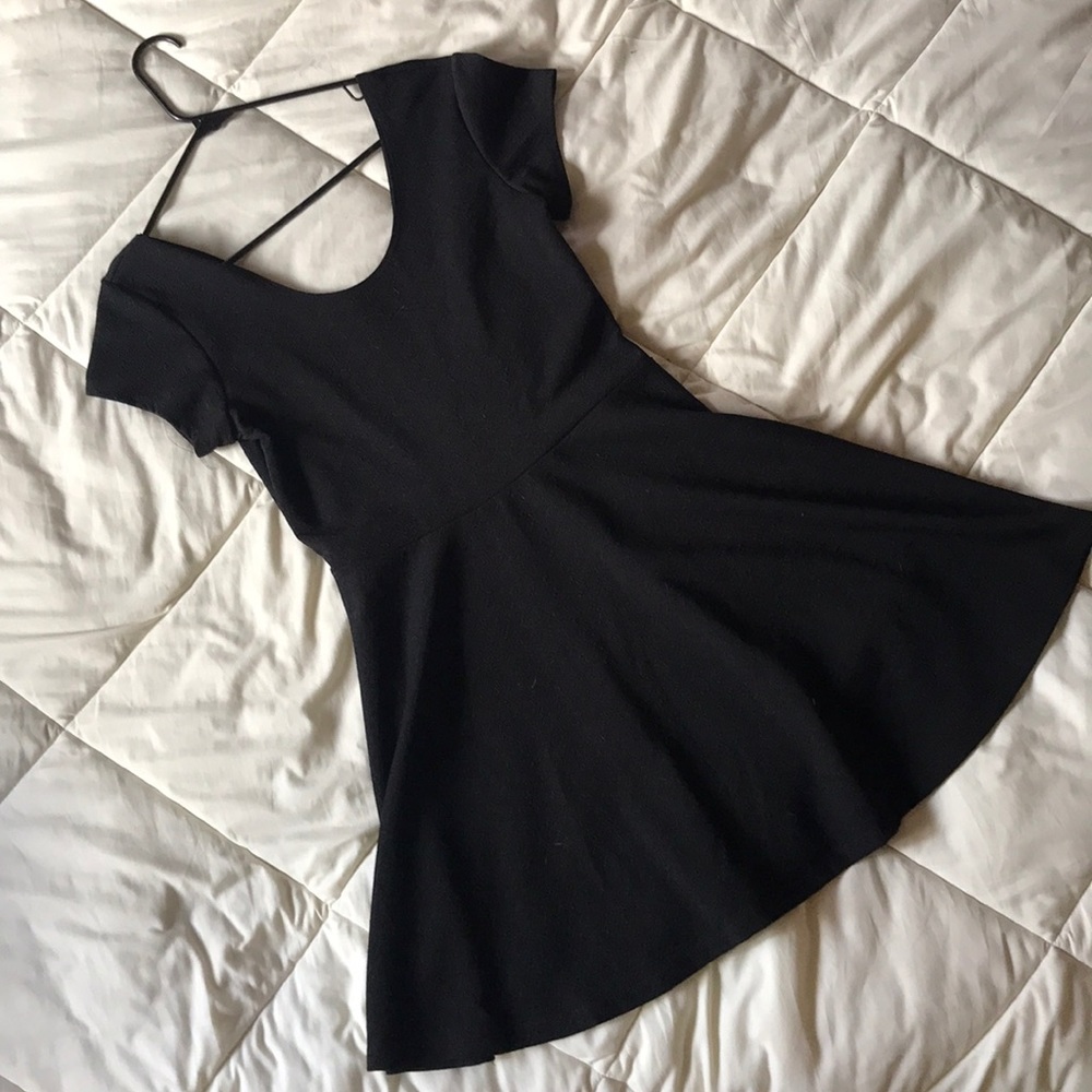 Black cinched dress above knee